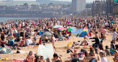 Scots flock to beaches sparking fears over large gatherings as temperatures soar - www.dailyrecord.co.uk - Scotland