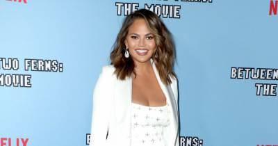 Chrissy Teigen Poses Topless After Breast Implant Removal — and Shows Off Wicked Sunburn - www.usmagazine.com