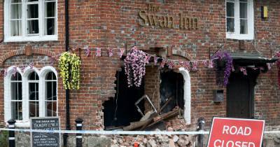 A car crashed through the front of a pub early this morning- but it still managed to open its doors today - www.manchestereveningnews.co.uk