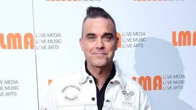 Robbie Williams says he was threatened with being beheaded in Haiti - www.breakingnews.ie - county Williams - Haiti