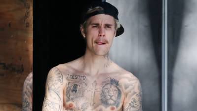 Justin Bieber Shows Off Toned Abs Tattoos As He Works Out Shirtless — Pic - hollywoodlife.com