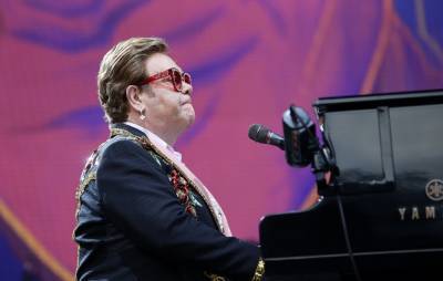 Elton John honoured with new commemorative coin - www.nme.com - Britain