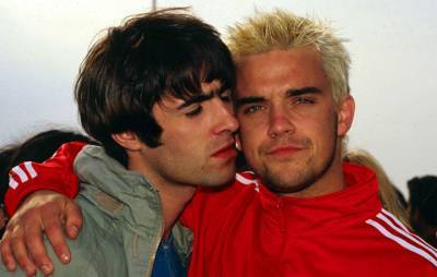 Robbie Williams says he needs to “find someone new to resent” after resolving Liam Gallagher feud - www.nme.com