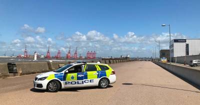Woman dies after being swept out to sea off Wirral coast - www.manchestereveningnews.co.uk