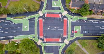 'UK-first' CYCLOPS junction with segregated cycle lanes protecting cyclists from traffic opens in south Manchester - manchestereveningnews.co.uk - Britain - Manchester - city Chester