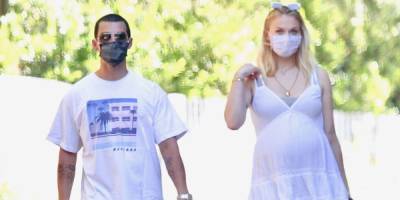 Sophie Turner Wore the Perfect Little White Dress for a Walk with Joe Jonas - www.harpersbazaar.com - Los Angeles