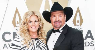 Garth Brooks and Trisha Yearwood ‘Are Fine’ After Their Camp Was Possibly Exposed to COVID-19 - www.usmagazine.com