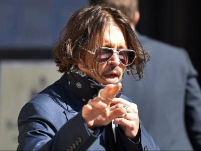 Johnny Depp rejects ex-wife's abuse claims in libel action against U.K. tabloid - torontosun.com
