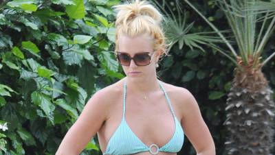 Britney Spears, 38, Shows Off Her Super Bendy Beach Yoga Skills While Wearing Protective Gear - hollywoodlife.com