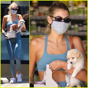 Kaia Gerber Cradles Adorable Puppy In Her Arms On a Juice Run - www.justjared.com - Los Angeles