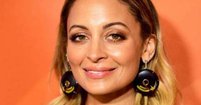 Nicole Richie unveils purple hair and is twinning with daughter Harlow - www.msn.com