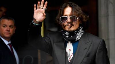 Depp cross-examined in libel case over Heard 'abuser' label - abcnews.go.com - Britain - London
