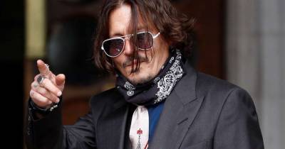 Actor Depp denies slapping ex-wife in row over 'Wino forever' tattoo - www.msn.com - Britain