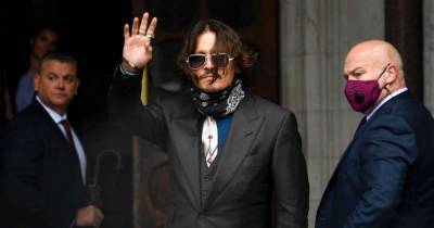 Johnny Depp denies slapping ex-wife Amber Heard after she laughed at ‘Wino Forever’ tattoo - www.msn.com