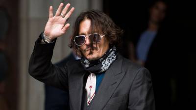 Johnny Depp Denies Slapping Amber Heard Over Tattoo Joke - variety.com - London