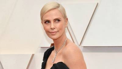 Charlize Theron Shares a Throwback Video of Herself Shaving Her Head for 'Mad Max: Fury Road' - www.etonline.com - Los Angeles