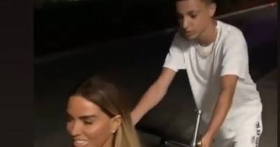 Katie Price hits the town in a wheelchair after breaking both her feet - www.manchestereveningnews.co.uk - Manchester