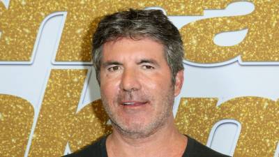 Simon Cowell undergoes surgery for broken back after bike accident - www.foxnews.com - Los Angeles