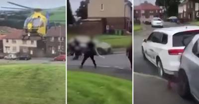 Disturbing video footage shows car being driven at man during violent weekend disturbance in Rochdale - www.manchestereveningnews.co.uk