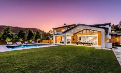 Lori Loughlin, Mossimo Giannulli Downsize to $9.5 Million Hidden Hills Mansion - variety.com