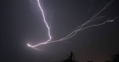 When thunder and lightning strike today as yellow Met Office weather warning in place - www.manchestereveningnews.co.uk - Britain - Manchester