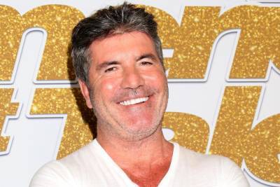 Simon Cowell Is Walking Again After Back Surgery - etcanada.com - USA