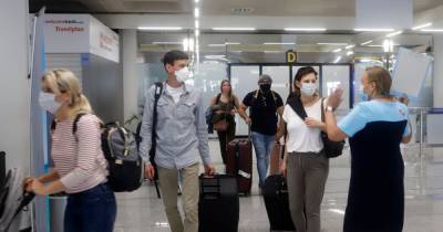 Warning for Brits over France face mask rule after travellers 'told they're not allowed to board flights' - www.manchestereveningnews.co.uk - Britain - France