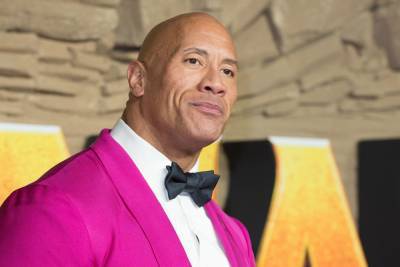 Dwayne Johnson tops Forbes rich list for second year - www.hollywood.com - city Sandler