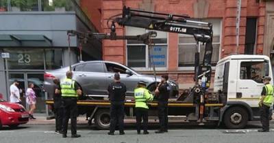 Jaguar driver found car being removed after parking in disabled bay - so he jumped inside and got towed with it - www.manchestereveningnews.co.uk - Manchester