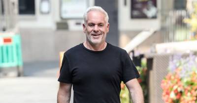 Chris Moyles shows off weight loss as he admits weighing himself 'six days a week' – but expert says he needs to 'break free' - www.ok.co.uk
