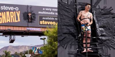 Steve-O Duct Tapes Himself to a Billboard to Promote New Comedy Special - www.justjared.com - Hollywood