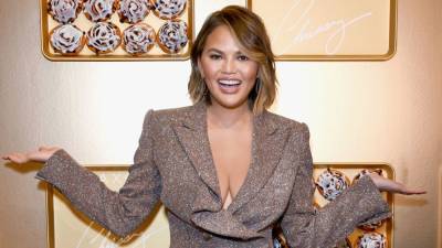 Chrissy Teigen Shows Off Her Growing Baby Bump After Revealing She's Expecting Third Child - www.etonline.com