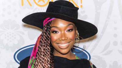 Brandy Reveals She's in Talks for a 'Moesha' Reboot, Tears Up Looking Back at Her Days on Sitcom (Exclusive) - www.etonline.com