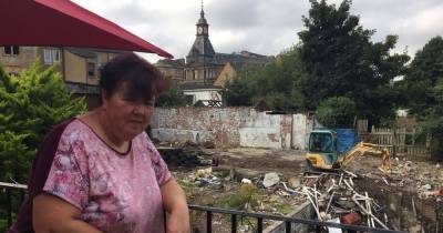 Paisley mum "ecstatic" after giant fly-tip behind flat is removed following two-year battle - www.dailyrecord.co.uk