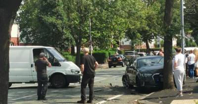 Man arrested and street cordoned off after three vehicle crash left petrol leaking onto the road - www.manchestereveningnews.co.uk - Manchester