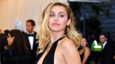 Miley Cyrus Talks Adoption, Divorcing Liam Hemsworth and Coping With ‘Death’-Like Heartache by Writing Lists - www.etonline.com - Australia