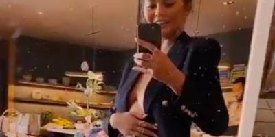 Chrissy Teigen Revealed Her Baby Bump After Announcing She's Pregnant With Her Third Child - www.marieclaire.com