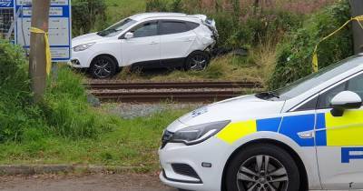 Emergency services race to scene to save driver of car struck by train - www.dailyrecord.co.uk - Scotland