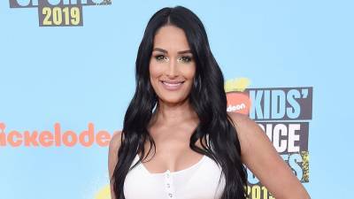 Nikki Bella Opens Up About Crying 'Happy Tears' During First Days as a New Mom - www.etonline.com