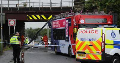 Passengers lucky escape as roof is sliced from double decker bus when it collides with railway bridge in Wishaw - www.dailyrecord.co.uk - Scotland