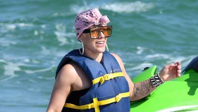 Pink Embraces Her Self-Professed ‘Thunder Thighs’ While Wakesurfing — See Pic - hollywoodlife.com