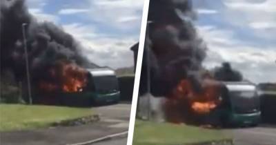 Dramatic footage shows bus engulfed in flames as fire breaks out in the street - www.manchestereveningnews.co.uk