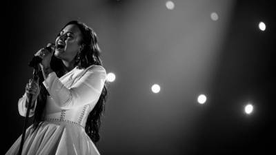 How Demi Lovato Turned Her Life Around With the Most Inspiring Comeback - www.etonline.com