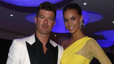 Robin Thicke's fiancee April Love Geary blasts body shamers mocking her weight gain: 'I am forever grateful' - www.foxnews.com