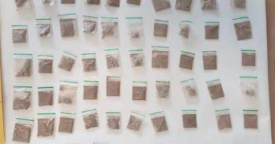 Police seize more than 150 bags of cocaine and heroin in early morning raid in Stockport - www.manchestereveningnews.co.uk - Manchester