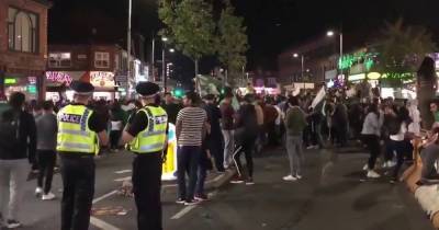 GMP condemn Curry Mile gatherings which saw hundreds shut down road and hurl missiles at police - www.manchestereveningnews.co.uk - Pakistan - Afghanistan