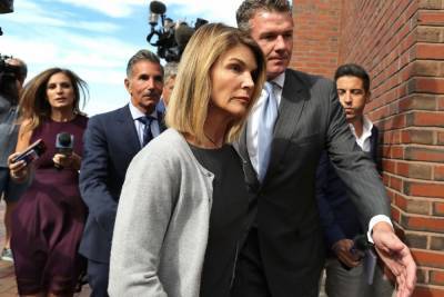 Lori Loughlin and Husband Mossimo Giannulli Sentenced to Jail Time for College Cheating Scandal - www.tvguide.com - state Massachusets