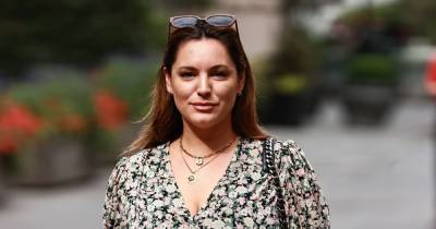 Kelly Brook showcases her enviable hourglass figure in a stunning floral dress as she heads to work - www.ok.co.uk