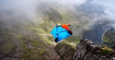Incredible footage shows base jumper leap 4,000ft from Scots mountain using wingsuit - www.dailyrecord.co.uk - Scotland