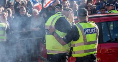 Loyalist thug hurled fireworks at Glasgow Irish Republican march leaving cop with burns - www.dailyrecord.co.uk - Ireland